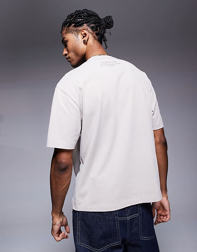 Asos ASOS DESIGN Heayweight Boxy Relaxed T-shirt In Washed Beige With Text Graphic