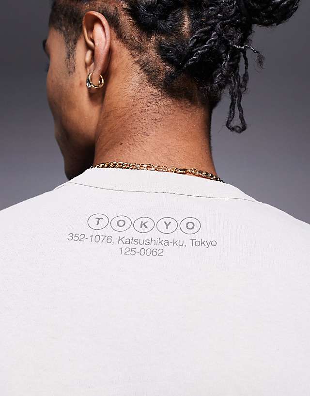 Asos ASOS DESIGN Heayweight Boxy Relaxed T-shirt In Washed Beige With Text Graphic