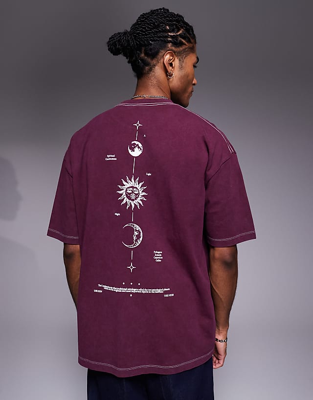asos ASOS DESIGN heayweight oversized t-shirt in washed black with celestial spine print in burgundy