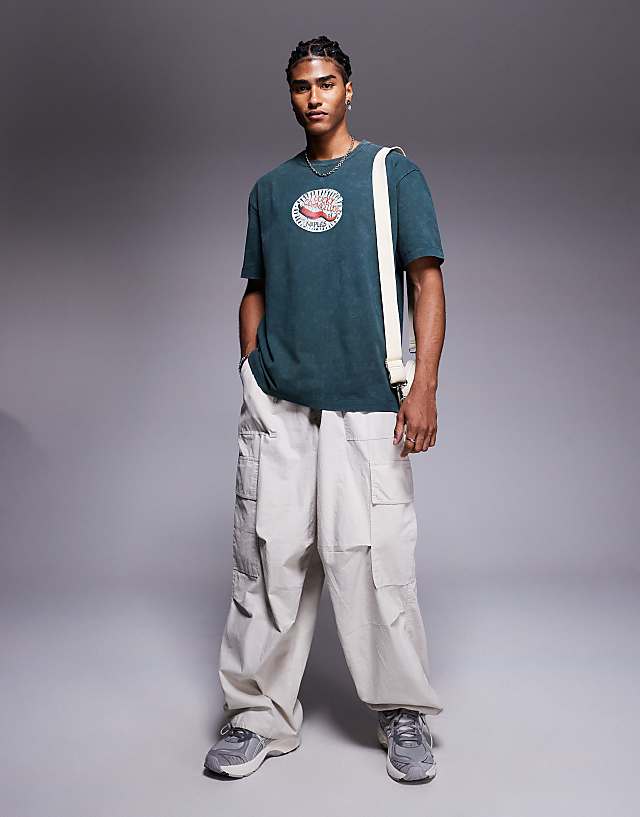 Asos ASOS DESIGN Heayweight Relaxed T-shirt With Chest Graphic In Washed Dark Green