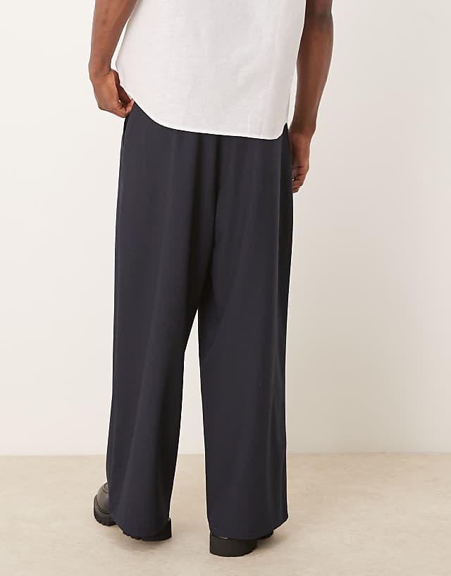 Asos ASOS DESIGN Horseshoe Fit Smart Trousers In Seersucker In Navy