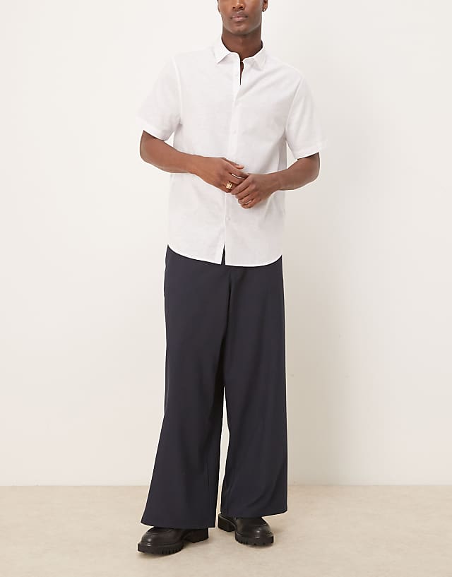 asos ASOS DESIGN horseshoe fit smart trousers in seersucker in navy