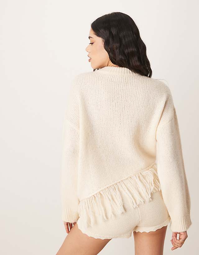 Asos ASOS DESIGN Knitted Crew Neck Jumper With Fringe Hem Detail In Cream
