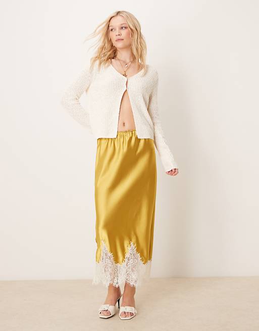 Asos ASOS DESIGN Knitted Hook And Eye Split Front Cardigan In Textured Yarn In Cream