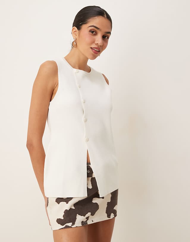 asos ASOS DESIGN knitted structured asymmetric button front waistcoat with split in cream