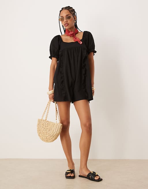 Asos ASOS DESIGN Linen Babydoll Puff Sleeve Playsuit With Bow Back Detail In Black