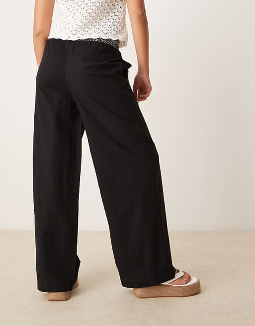 Asos ASOS DESIGN Linen Blend Pull On Wide Leg Trousers With Shirred Waist Detail In Black With Cream