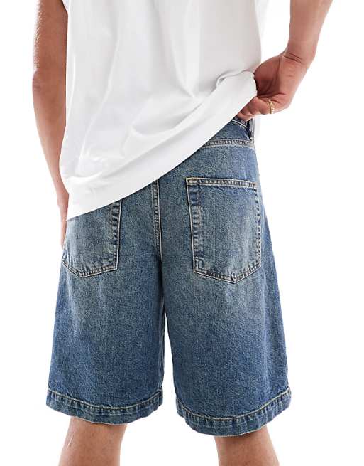 Asos ASOS DESIGN Long Length Denim Jort In Mid Wash Blue
