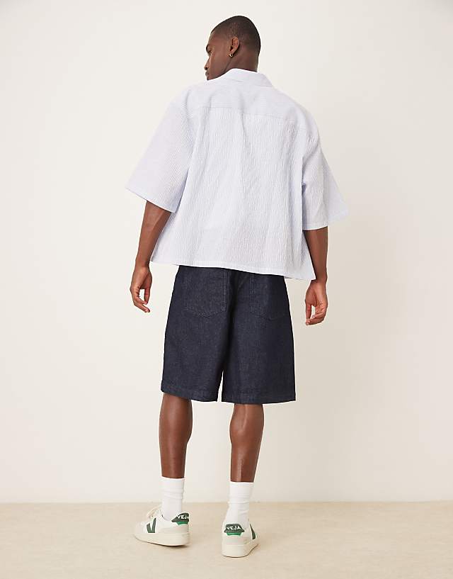 Asos ASOS DESIGN Long Length Denim Jort In Raw Wash