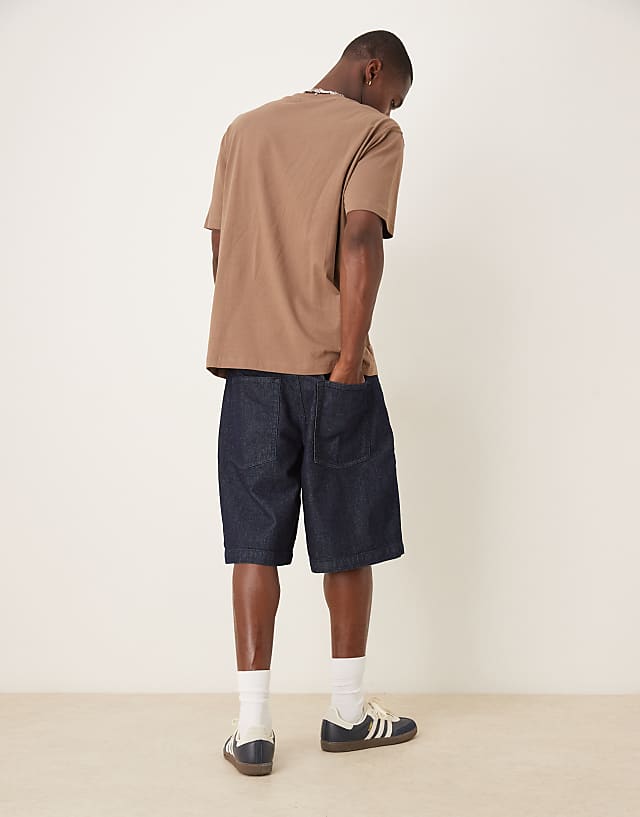 Asos ASOS DESIGN Long Length Denim Jort In Raw Wash