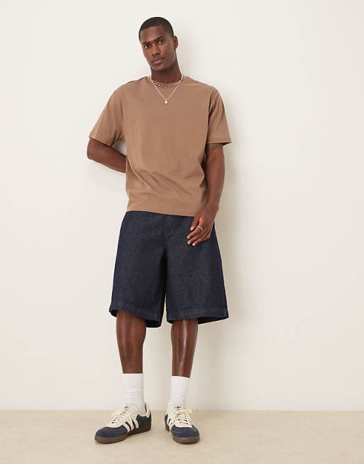 asos ASOS DESIGN long length denim jort in raw wash