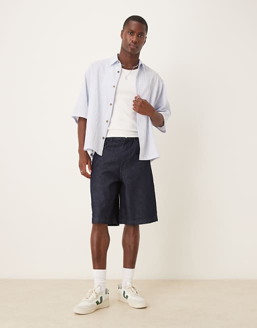 asos ASOS DESIGN long length denim jort in raw wash