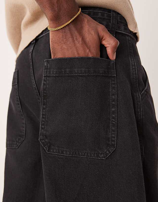 Asos ASOS DESIGN Long Length Denim Jort With Pleats And Self Tie In Washed Black