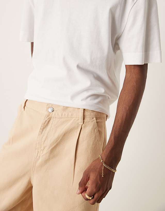 Asos ASOS DESIGN Long Length Pleated Shorts In Beige