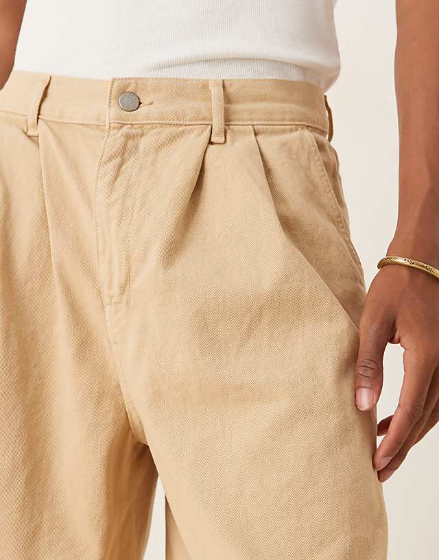 Asos ASOS DESIGN Long Length Pleated Shorts In Beige