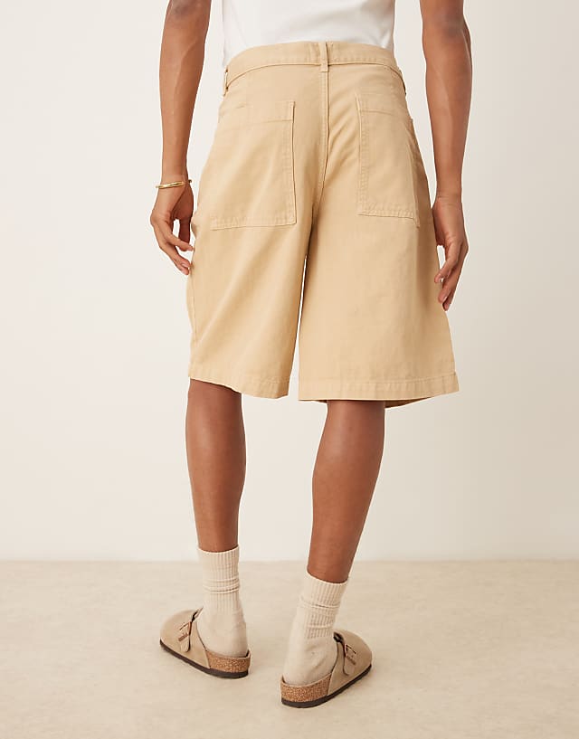Asos ASOS DESIGN Long Length Pleated Shorts In Beige