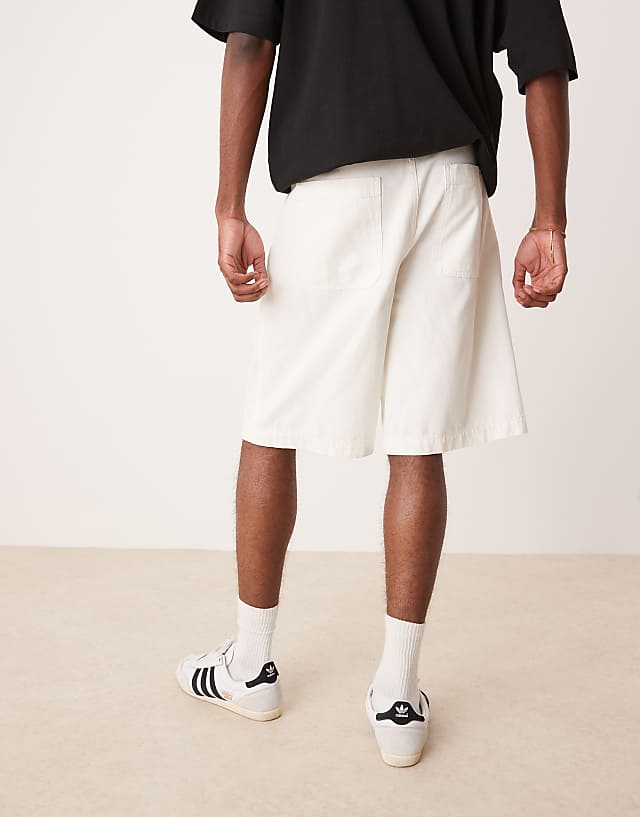 Asos ASOS DESIGN Long Length Pleated Shorts With Self Tie In Ecru