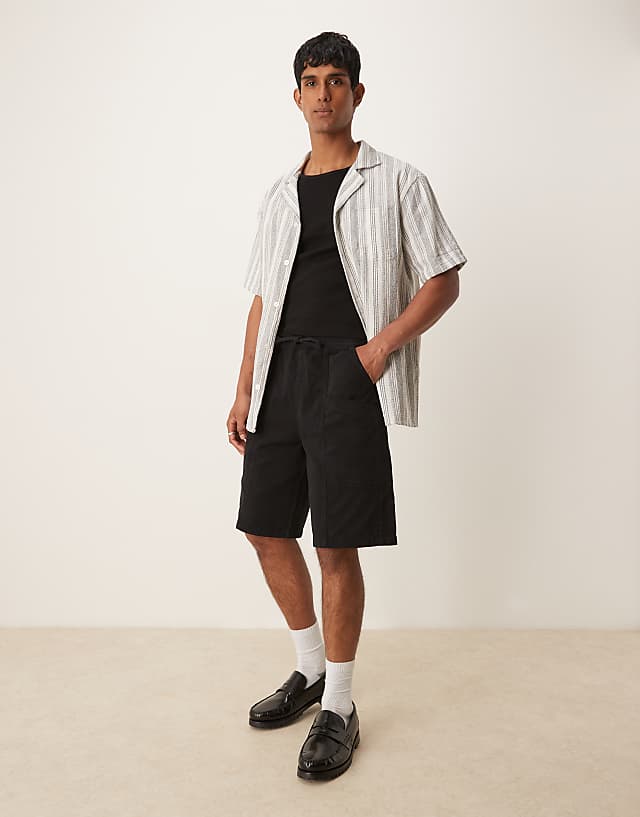 asos ASOS DESIGN long length pull on cargo shorts in black