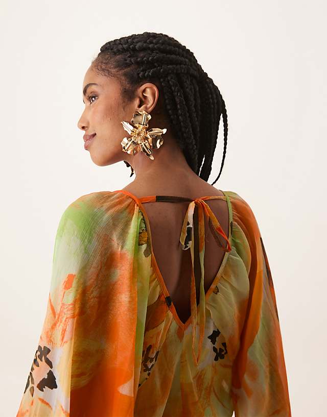 Asos ASOS DESIGN Long Sleeve Puff Blouson Maxi Dress In Overblown Orange Floral Print