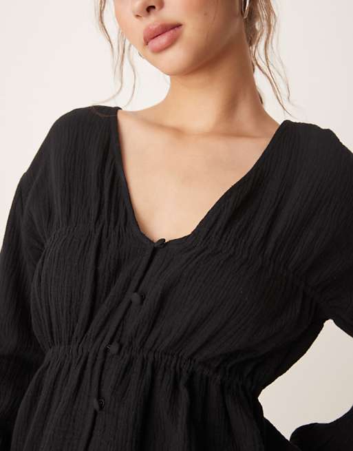 Asos ASOS DESIGN Long Sleeve Smock Top With Button Front In Black