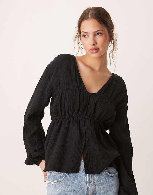 asos ASOS DESIGN long sleeve smock top with button front in black