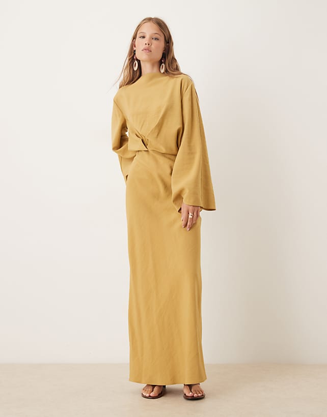 asos ASOS DESIGN long sleeve tucked waist bias maxi dress in gold