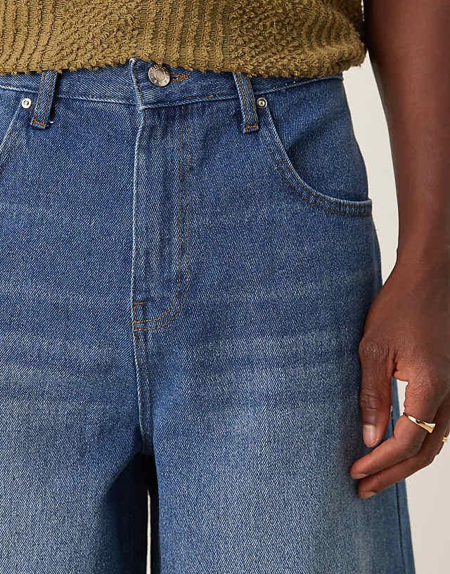 Asos ASOS DESIGN Longer Length Denim Jort In Mid Wash Blue