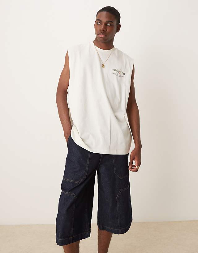Asos ASOS DESIGN Longer Length Denim Jort In Mid Wash Blue