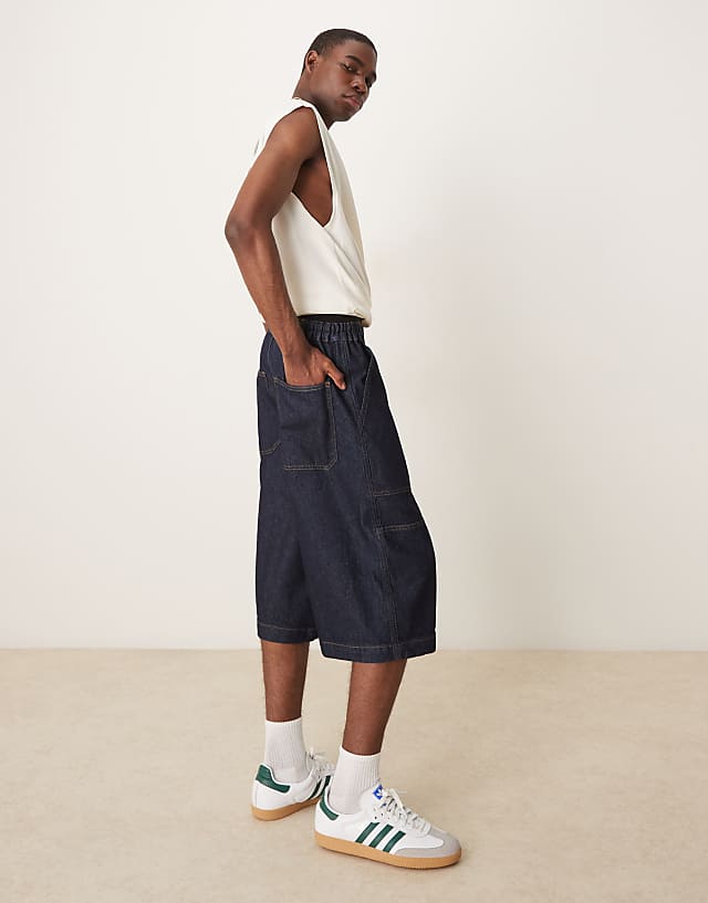 Asos ASOS DESIGN Longer Length Denim Jort In Mid Wash Blue