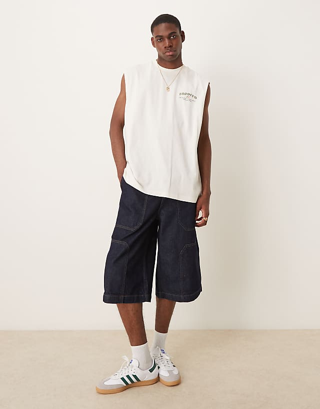 asos ASOS DESIGN longer length denim jort in mid wash blue