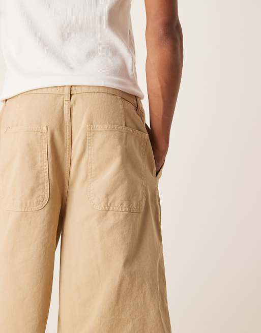 Asos ASOS DESIGN Longer Length Shorts In Beige With Double Pleats