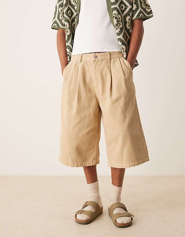 asos ASOS DESIGN longer length shorts in beige with double pleats
