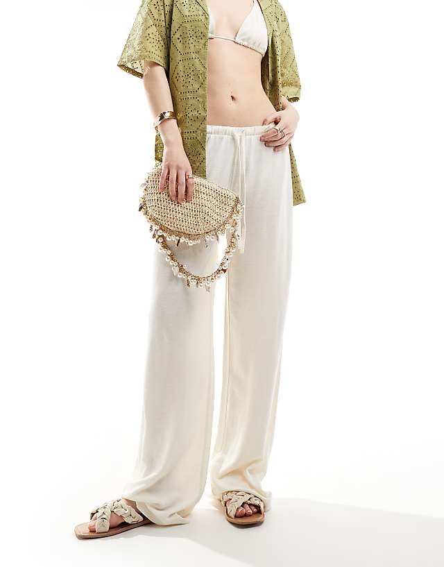asos ASOS DESIGN low rise linen look trousers in cream