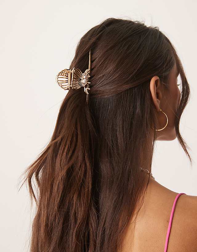 asos ASOS DESIGN metal XL claw with shell design and pearl detail in gold