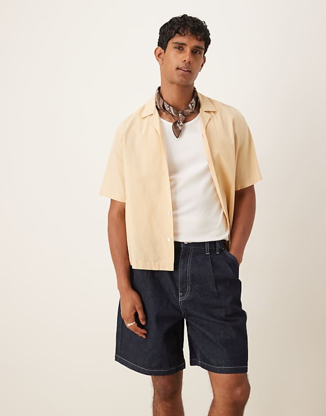 asos ASOS DESIGN mid length denim jort with double pleats in raw wash