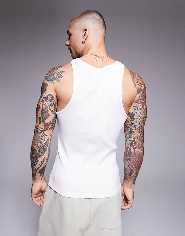 Asos ASOS DESIGN Muscle Fit Henley Rib Vest In White