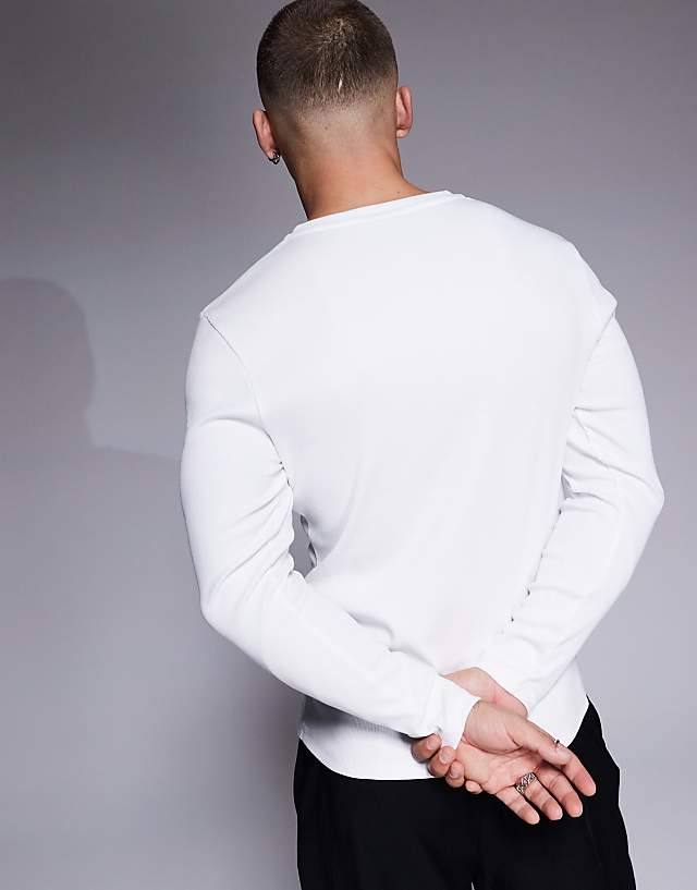 Asos ASOS DESIGN Muscle Fit Long Sleeve Rib T-shirt With Notch Neck In White