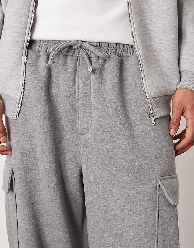 Asos ASOS DESIGN New Fit Super Baggy Jogger With Utility Pockets In Dark Grey Marl