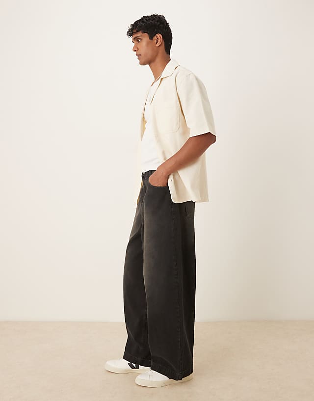 Asos ASOS DESIGN Oversized Baggy Jeans In Black Wash With Brown Tint