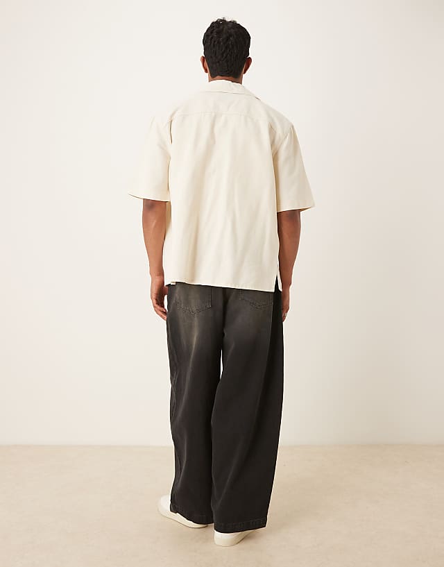 Asos ASOS DESIGN Oversized Baggy Jeans In Black Wash With Brown Tint