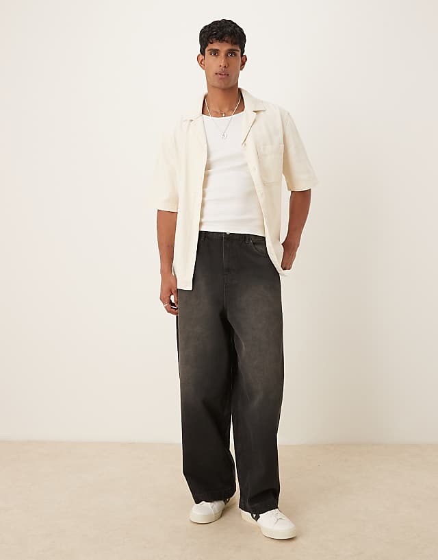 asos ASOS DESIGN oversized baggy jeans in black wash with brown tint