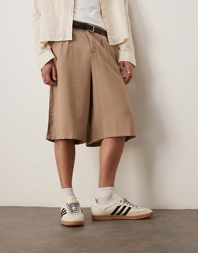 Asos ASOS DESIGN Oversized Bemuda Shorts With Pleat Details In Sand
