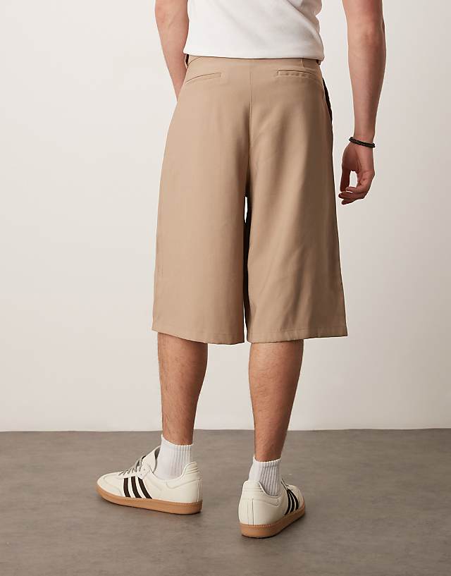 Asos ASOS DESIGN Oversized Bemuda Shorts With Pleat Details In Sand