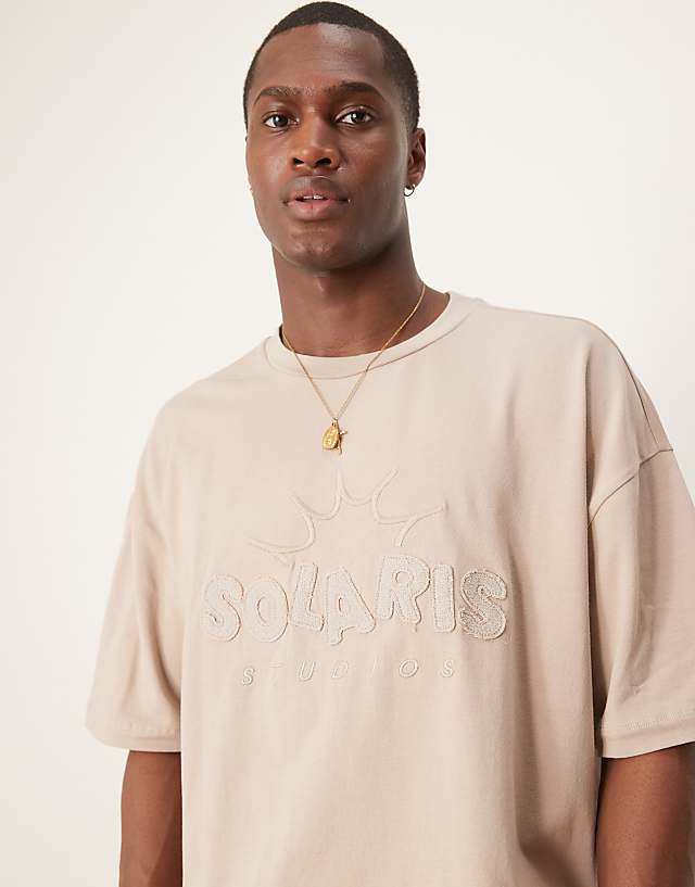 Asos ASOS DESIGN Oversized Boxy 240gsm Heavweight T-shirt In With Applique Chest Print In Beige