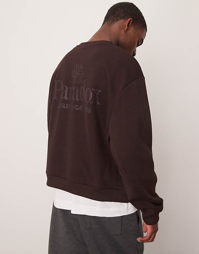 Asos ASOS DESIGN Oversized Boxy Sweatshirt With Underarm Panels And Chest Print In Dark Brown