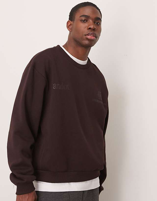 asos ASOS DESIGN oversized boxy sweatshirt with underarm panels and chest print in dark brown