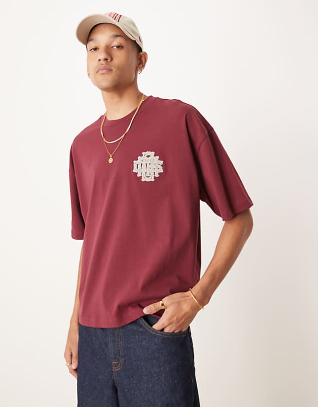 asos ASOS DESIGN oversized boxy t-shirt in burgundy with chest applique