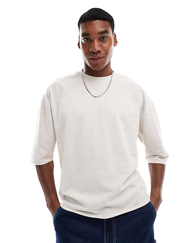 asos ASOS DESIGN oversized boxy textured t-shirt with raw hem in beige marl