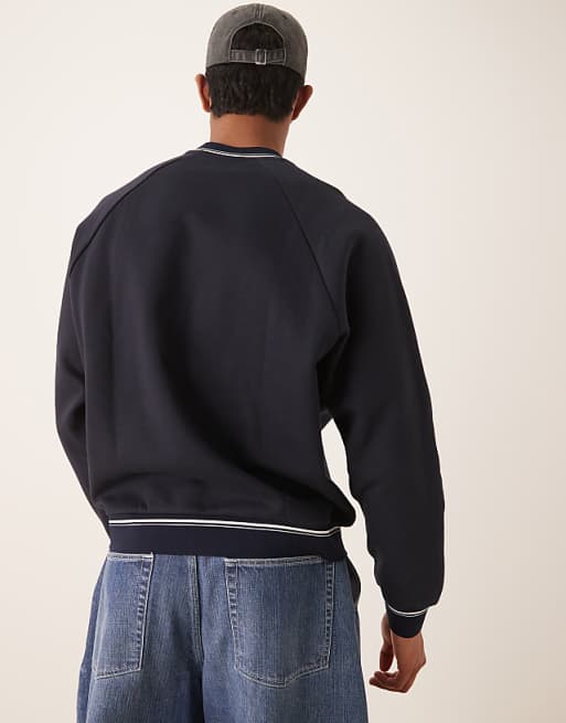 Asos ASOS DESIGN Oversized Crew With Tipping Detail In Navy Blue