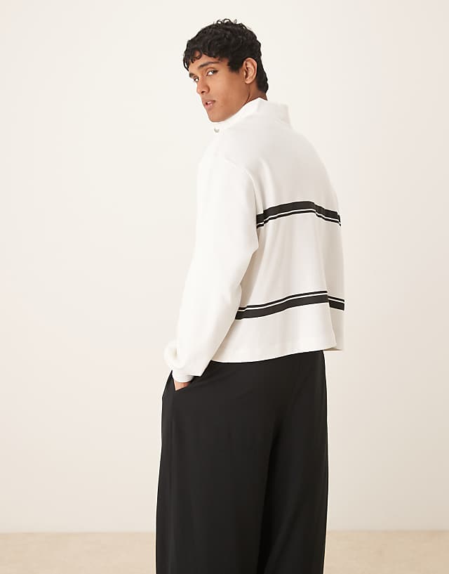 Asos ASOS DESIGN Oversized Drop Shoulder Boxy Funnel Neck Lightweight Rib Sweatshirt With Stripe In Off White